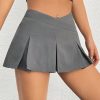 Women'S Solid Color V-Shaped Waistband Pleated Mini Skirt