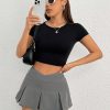 Women'S Solid Color V-Shaped Waistband Pleated Mini Skirt