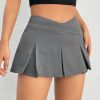 Women'S Solid Color V-Shaped Waistband Pleated Mini Skirt